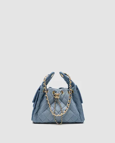 Chanel 25 Handbag in Denim With Gold Hardware